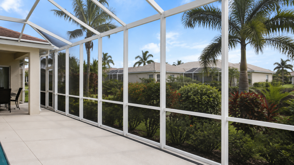 Clean pool cage framing and screen enclosure at a Cape Coral home
