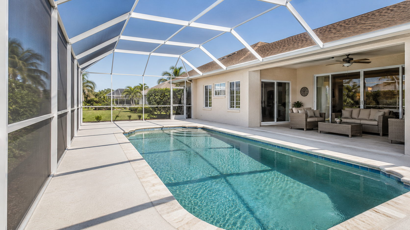 Clean screened pool enclosure, lanai, and pool deck after exterior cleaning